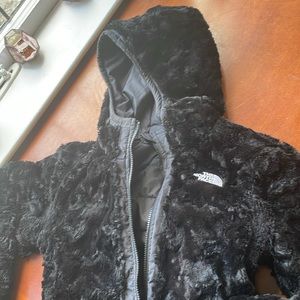 Girls black reversible North Face jacket. Size M (10/12).